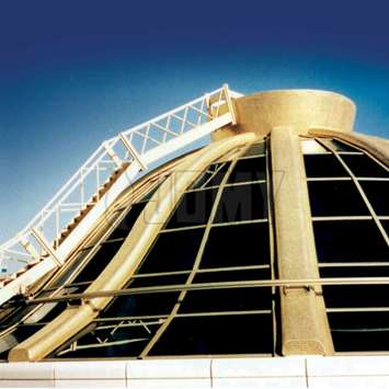 Circular pivoting BMU with stairs in multiple sections and inclinations for façade and glass dome maintenance. Circular BMU with stairs for facade maintenance - Building Maintenance Unit